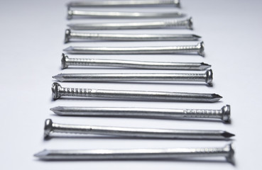 Row of nails lying opposite to each other
