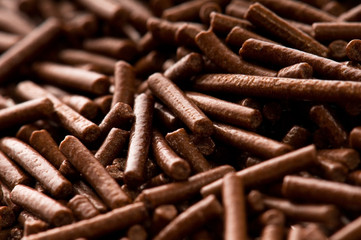 chocolate sprinkles on white background