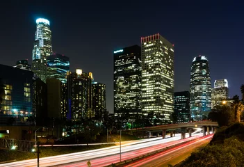 Tuinposter Traffic through Los Angeles at night © Andy