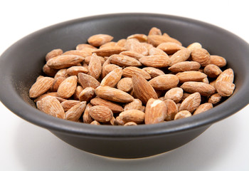 A bowl of salted almonds