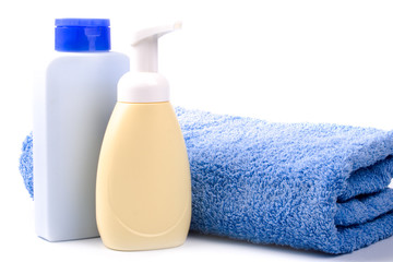 body care products and towel