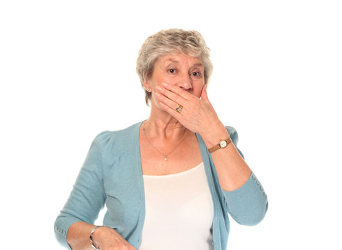 Senior Older Woman Covering Mouth