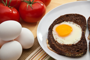 Sunny side up eggs in  toast