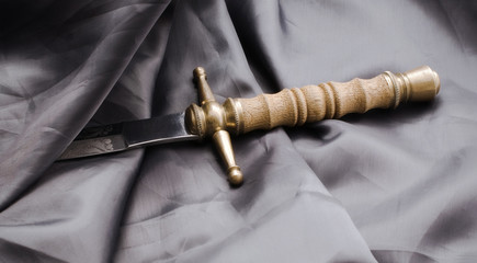 Raincoat and dagger