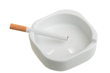 White ashtray with cigarette