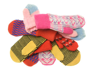 heap of multicoloured wool mittens