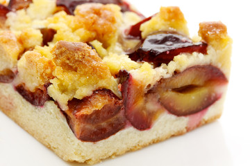 Fresh baked plum cake with pwdered sugar