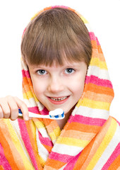 Boy brushing teeth, isolated on white background