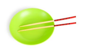 Asian food concept with plate and chopsticks