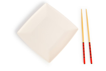 Asian food concept with plate and chopsticks
