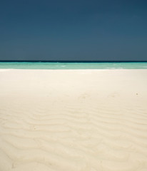 Fototapeta na wymiar Miękki biały piasek