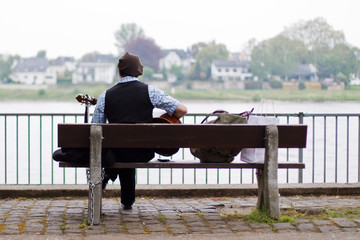 Busker on a bench