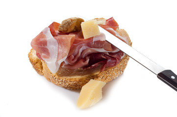 slice bread with parma ham and grana and dried fig