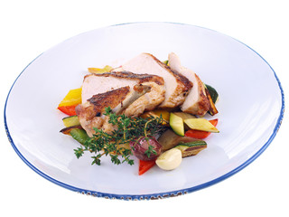 grilled chicken & mediterranean vegetables isolated on white