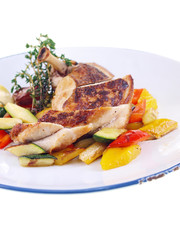 grilled chicken & mediterranean vegetables isolated on white