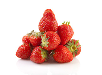 pile of fresh strawberries over white background