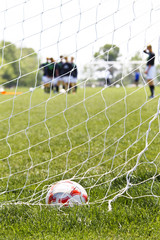 Soccer ball in goal