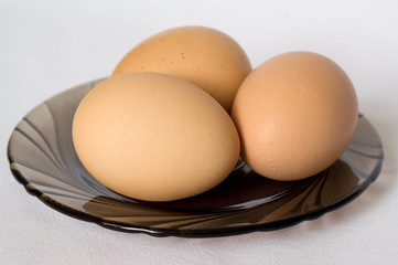 Chicken eggs on a plate