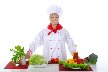 Handsome chef prepares breakfast.