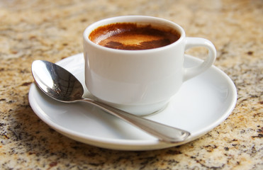 cup of coffee on a granit table