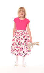 Young little girl with soft toy