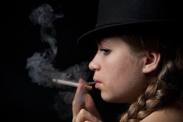 Obraz premium blonde smoking cigarette young fashion girl