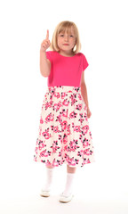Young little girl pointing
