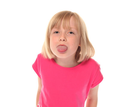 Young Little Girl Sticking Out Tongue