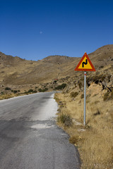 road sign on a deserted road