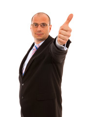 Businessman giving thumbs up