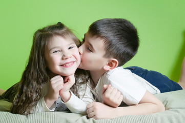 Brother sister kissing