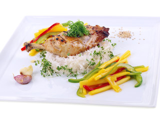 garlic chicken, rice & mango salad isolated on white background