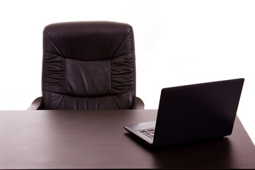 Laptop in a office desk, on white background