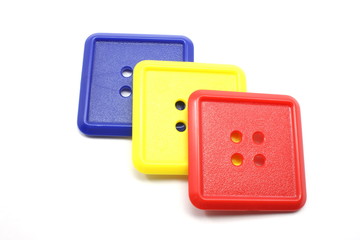 Blue Yellow and Red Square Buttons