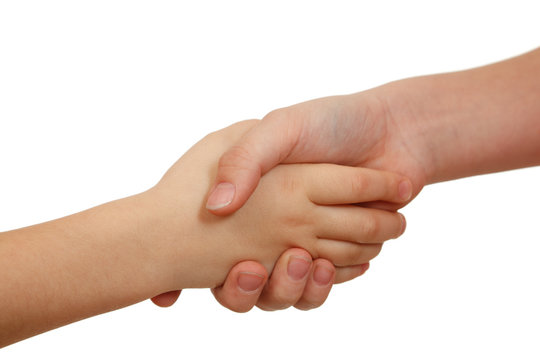 Handshake on white background. Children's hands. Close-up.