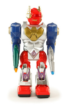 Colorful toy robot on white background. Front. Isolated.