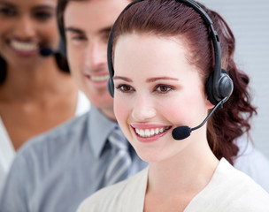 International customer service representatives standing in a lin