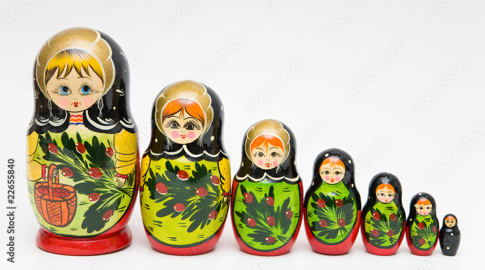 Wall mural russian matryoshka doll on white background