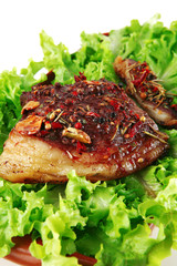 served steak with raw salad