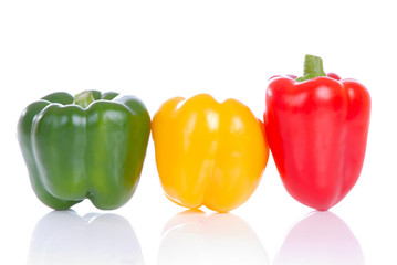 Green, yellow and red peppers isolated