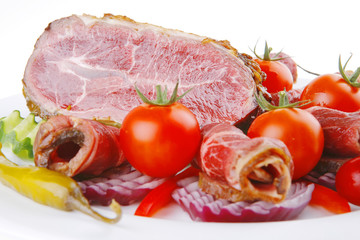 served meat chunk with rolls  on white