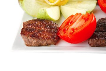 roast meat served on white