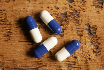 Pile of blue and white pills