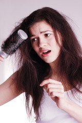 Girl with hairbrush