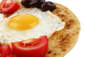fried eggs with vegetables