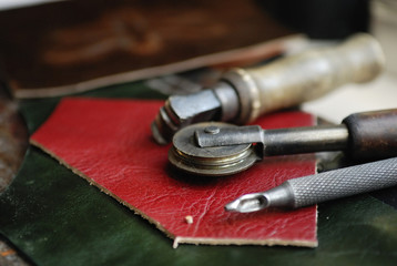 Piece of leather and some tools