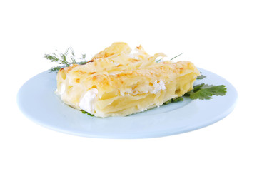 cheese cannelloni on blue plate