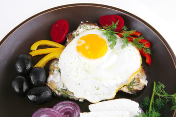 egg served on dark dish