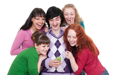 Fototapeta premium cheerful friends looking at cellphone