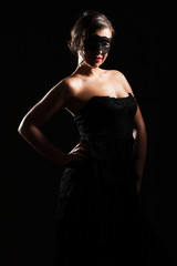 mysterious beautiful woman in mask